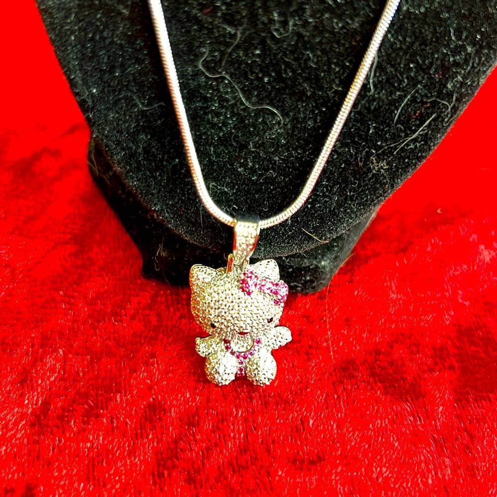 Hello Kitty style charm. 925 silver. 925 silver snake chain. Number one.